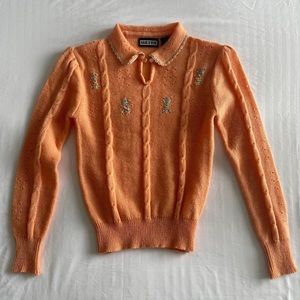 Vintage 80s coral cable sweater with a collar and keyhole neckline